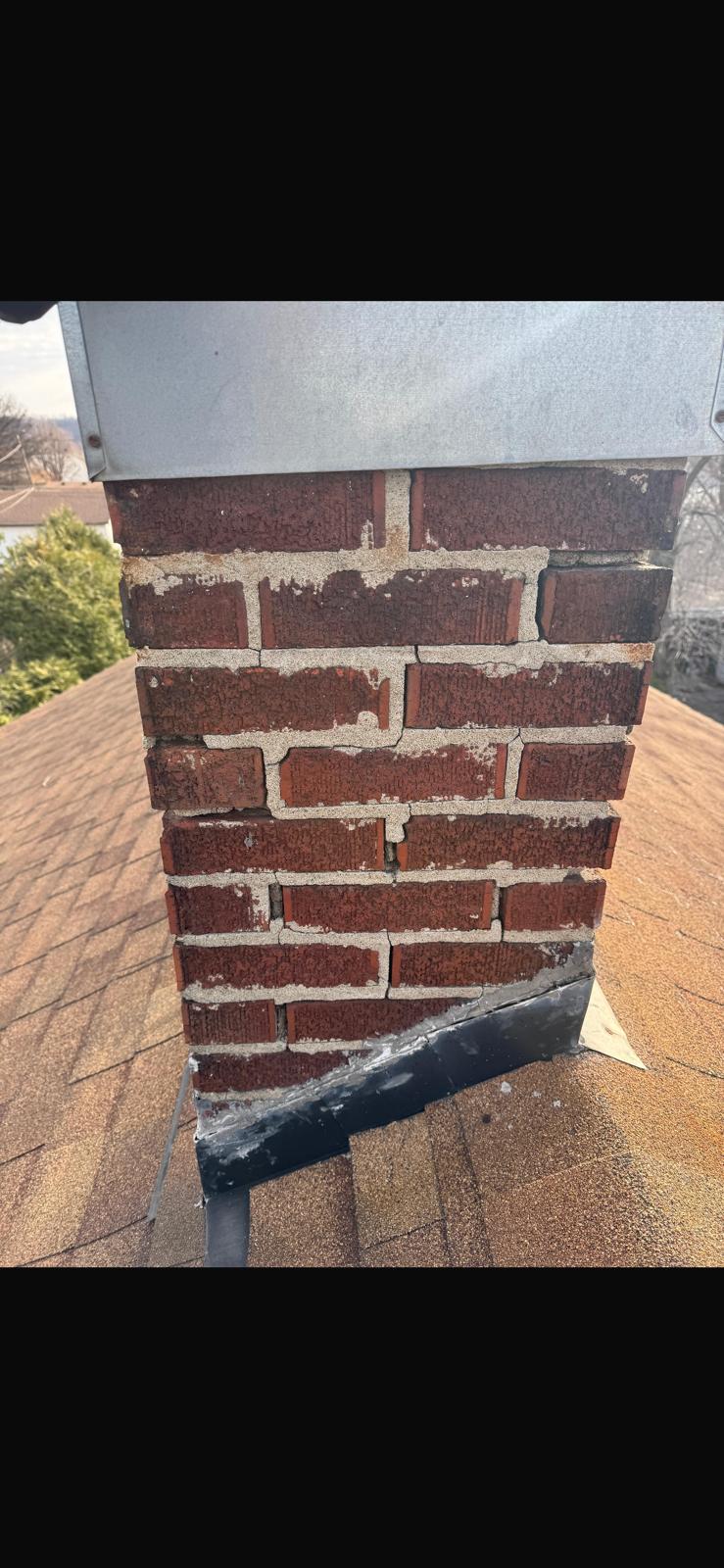 Chimney mortar showing severe deterioration before repair