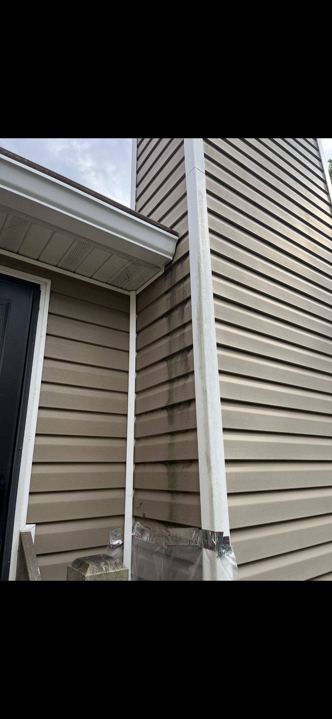 Exterior view of chimney chase with staining, O'Fallon Missouri
