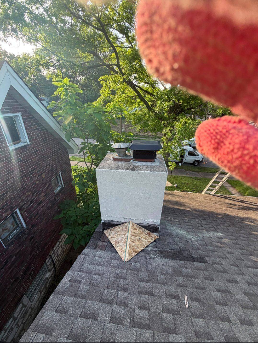 Decking and underlayment on a newly framed chimney cricket