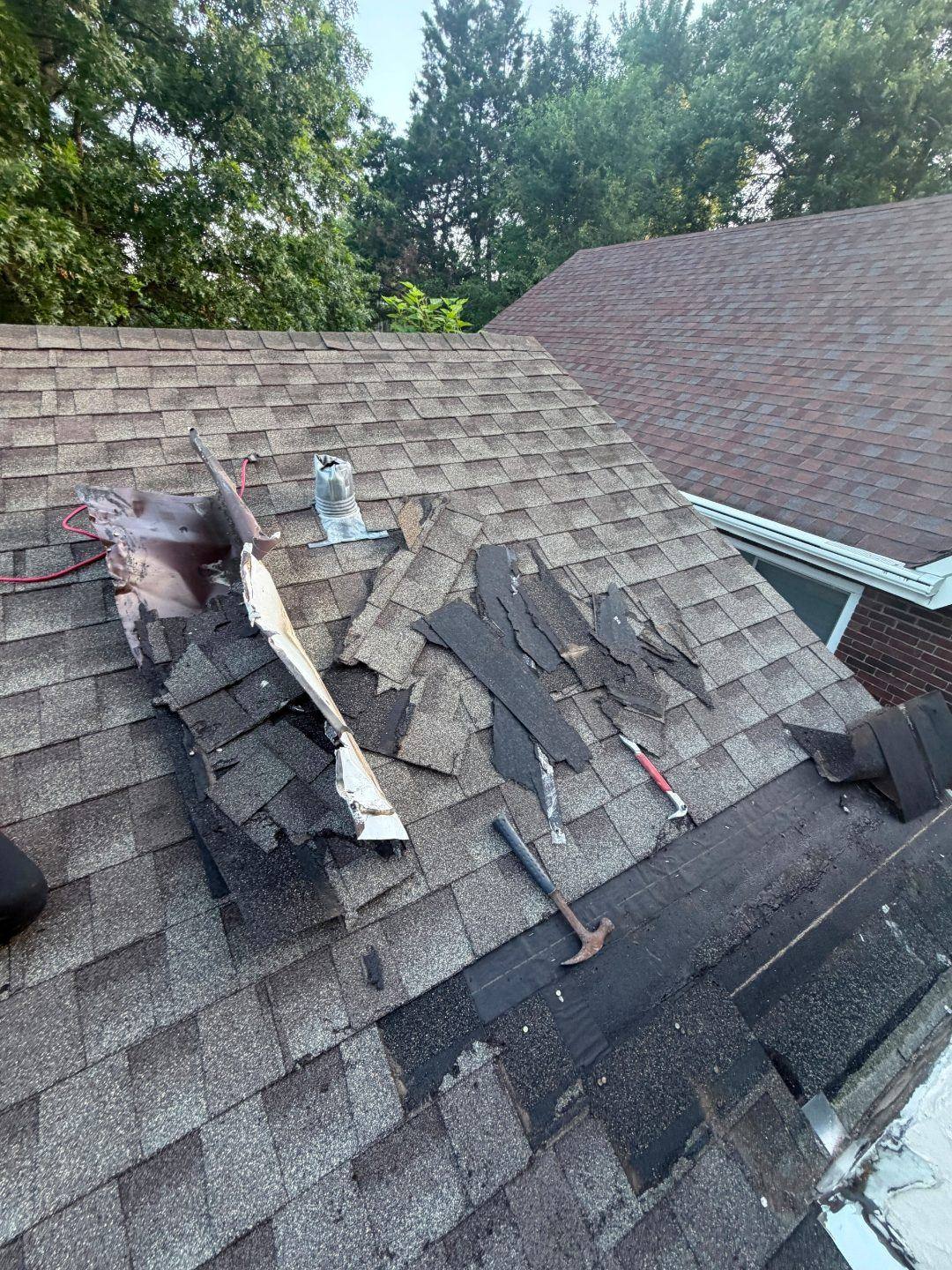 Roof behind a wide chimney with no cricket, South St. Louis