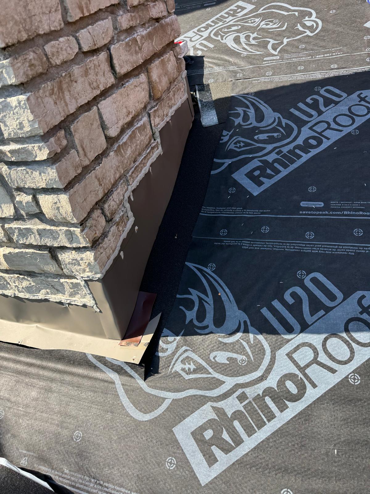 Chimney flashing separated from masonry before repair