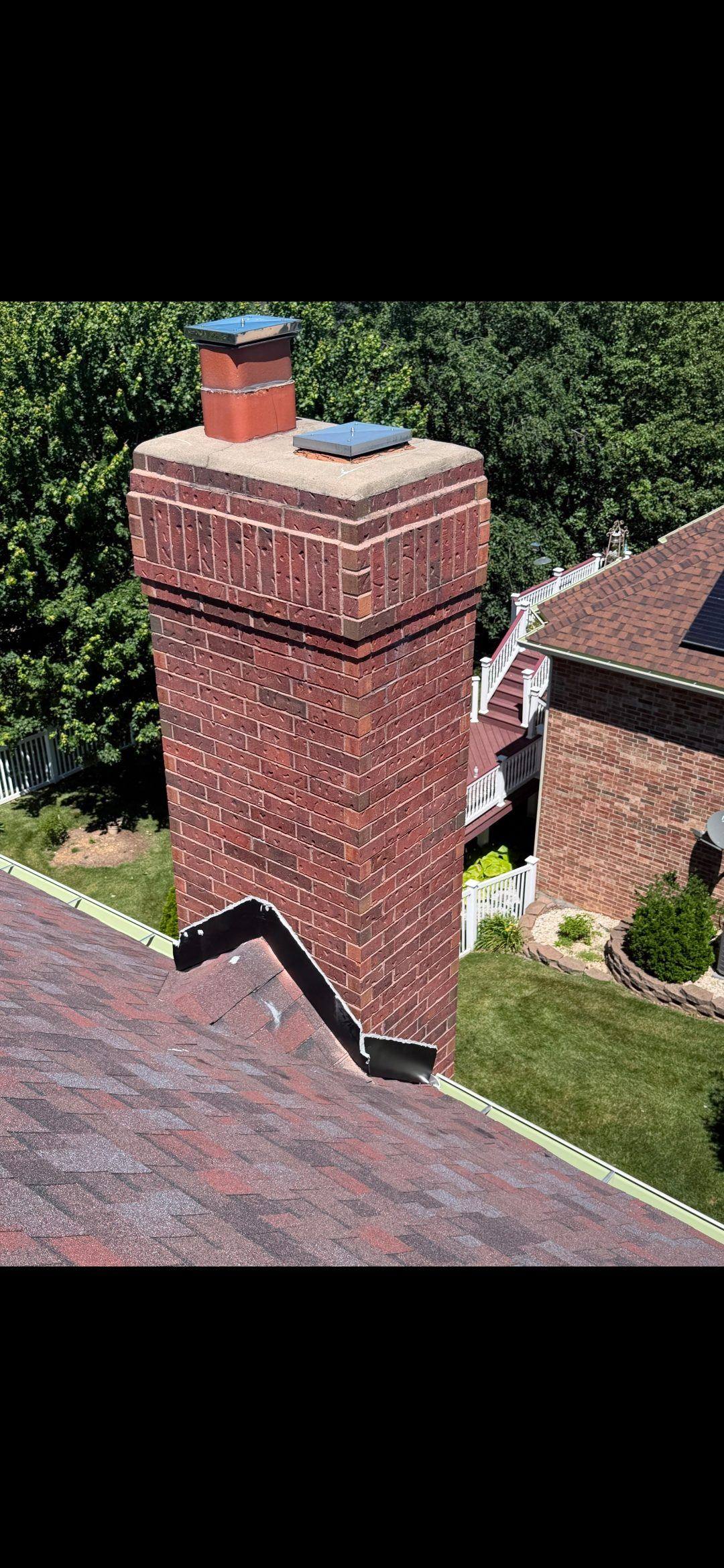 Installing a flue extender and repairing flashing on a Wentzville chimney