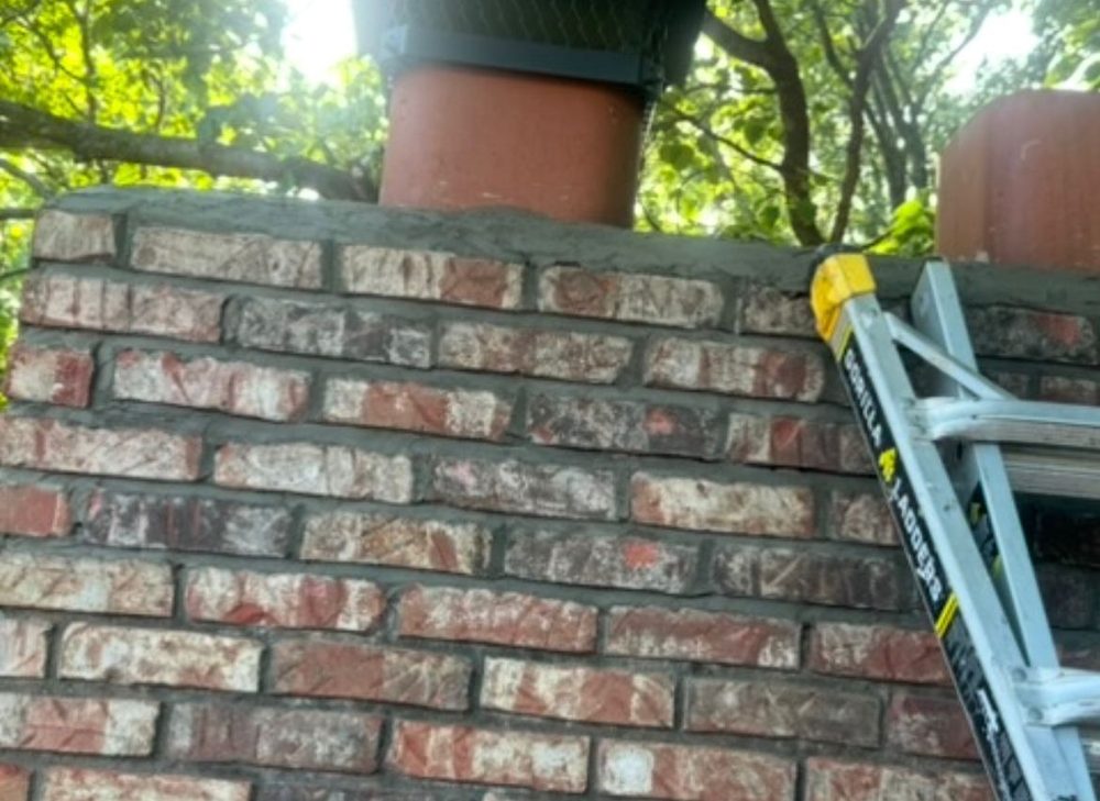 Tuckpointing complete on Chesterfield chimney with fresh mortar
