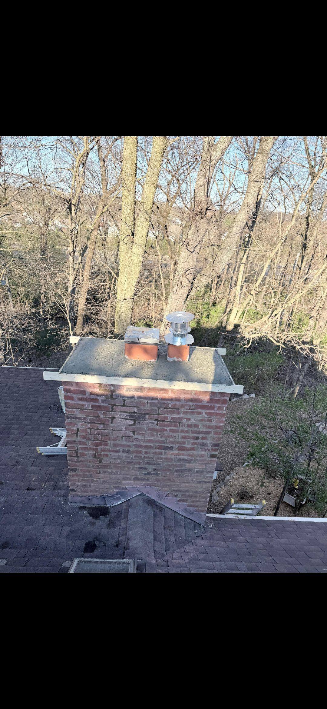 Installing a new flue liner for a water heater in a Chesterfield chimney