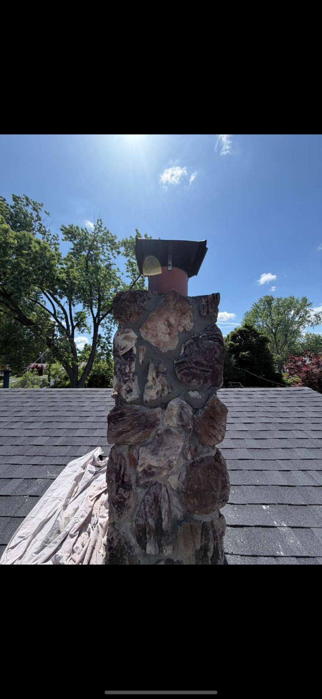 Finished natural stone chimney repointing
