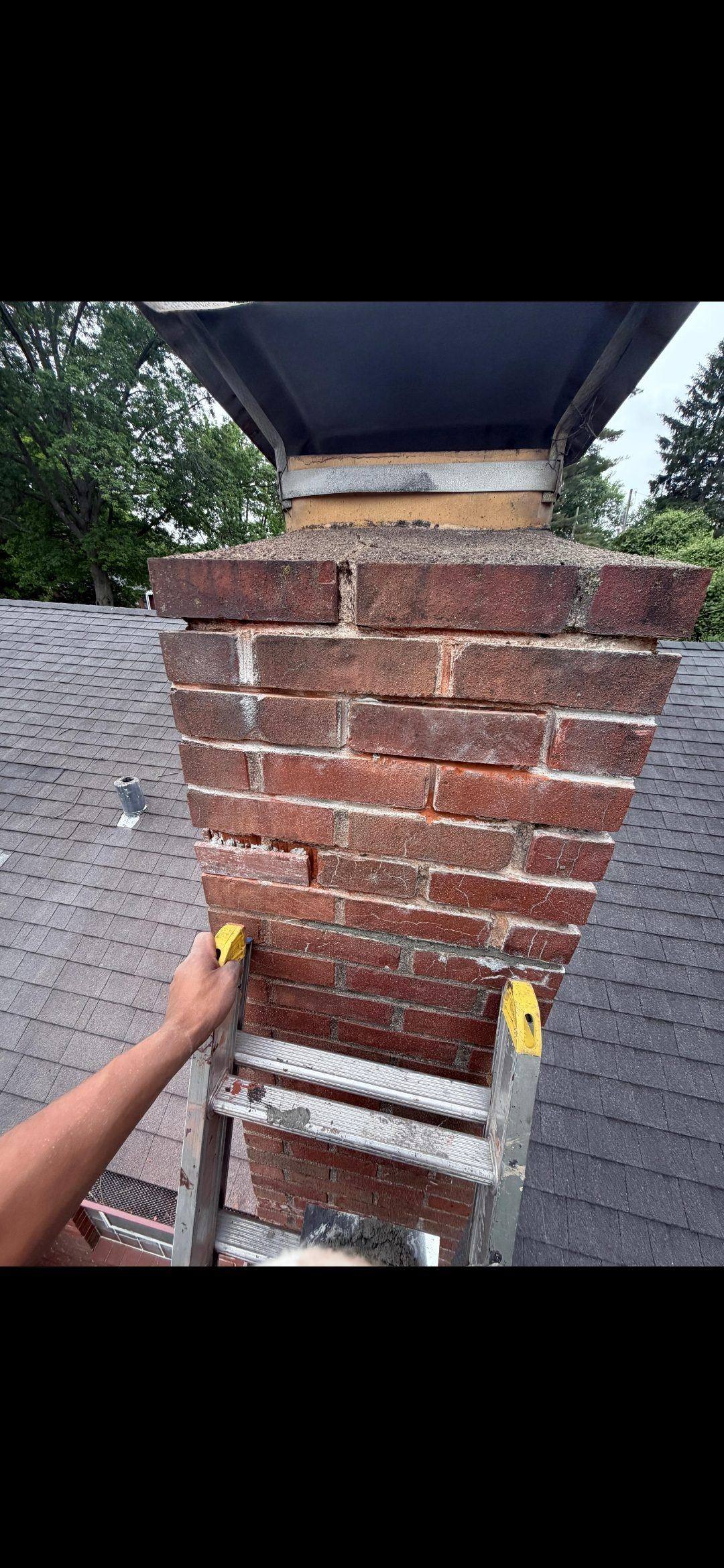 Repointing chimney joints with color-matched mortar