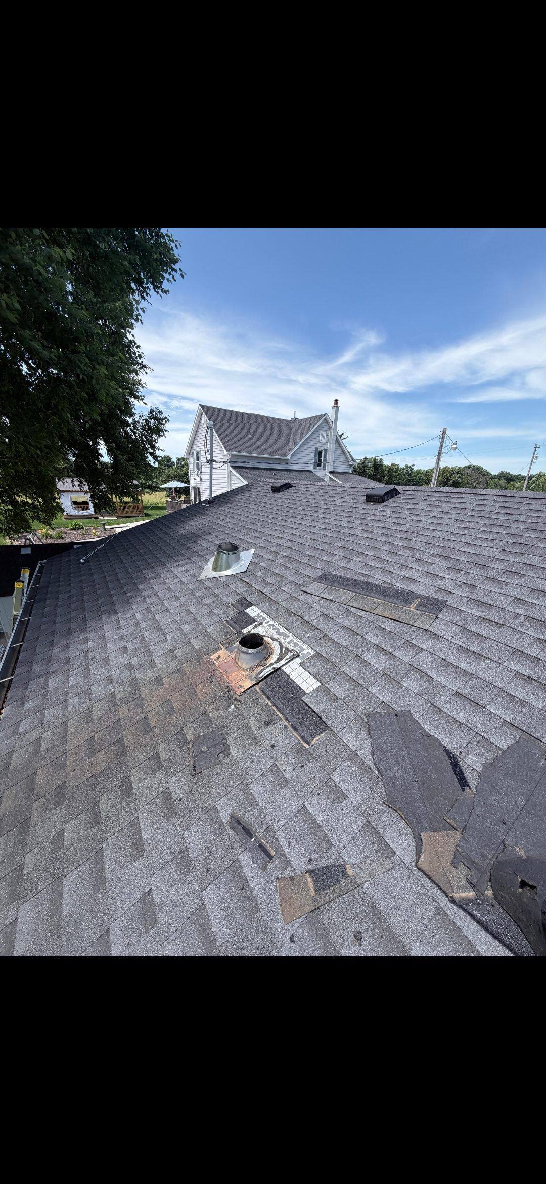 Roof flashing kit and storm collar on a Class A chimney